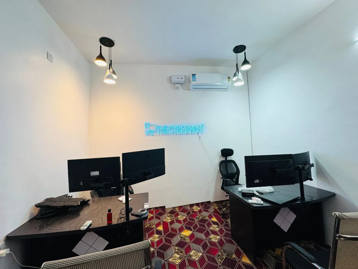 THECYBERHOST team cabin with neon sign, New Delhi